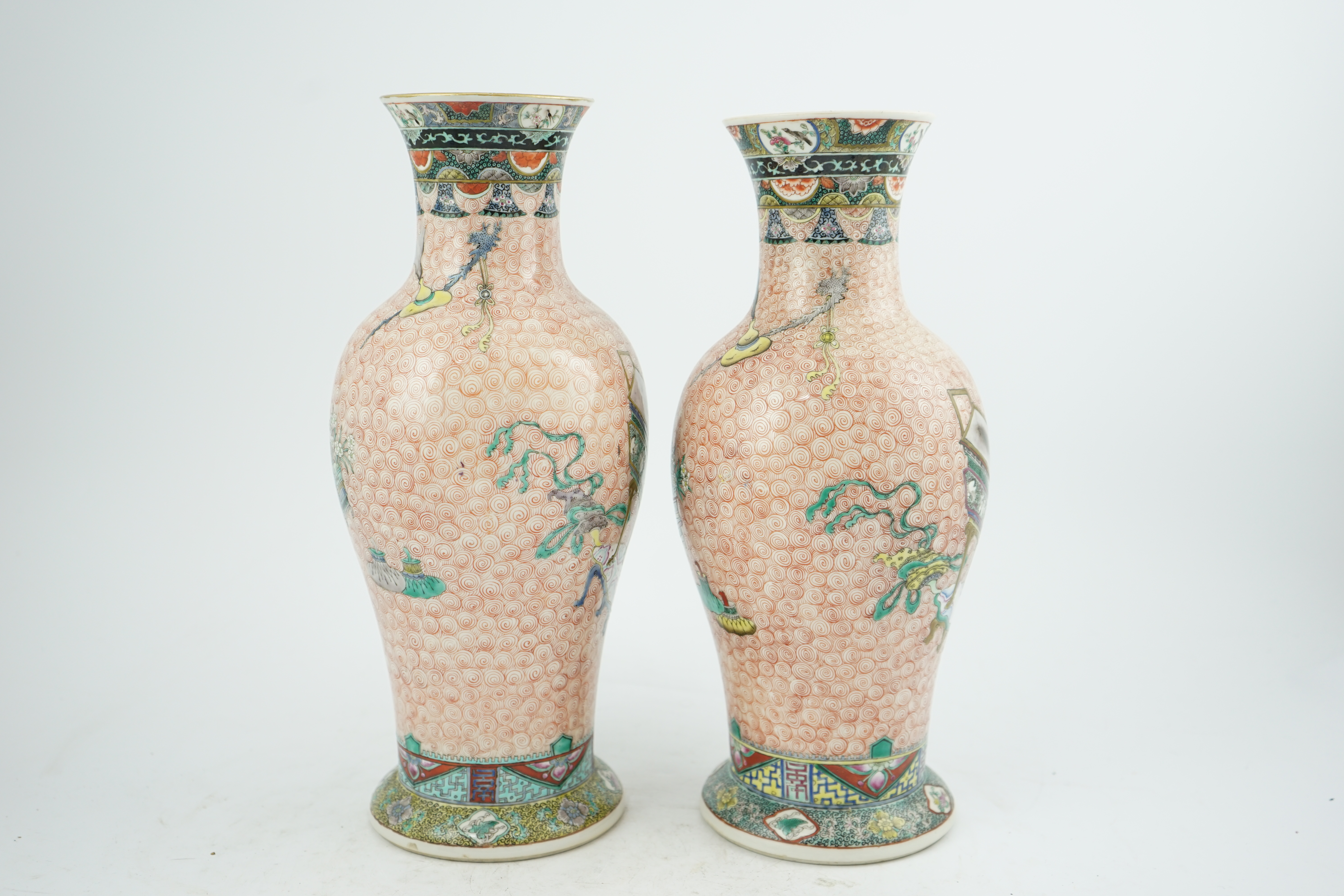 A near pair of Chinese famille rose ‘Hundred Antiques’ baluster vases, Kangxi mark, early 20th century